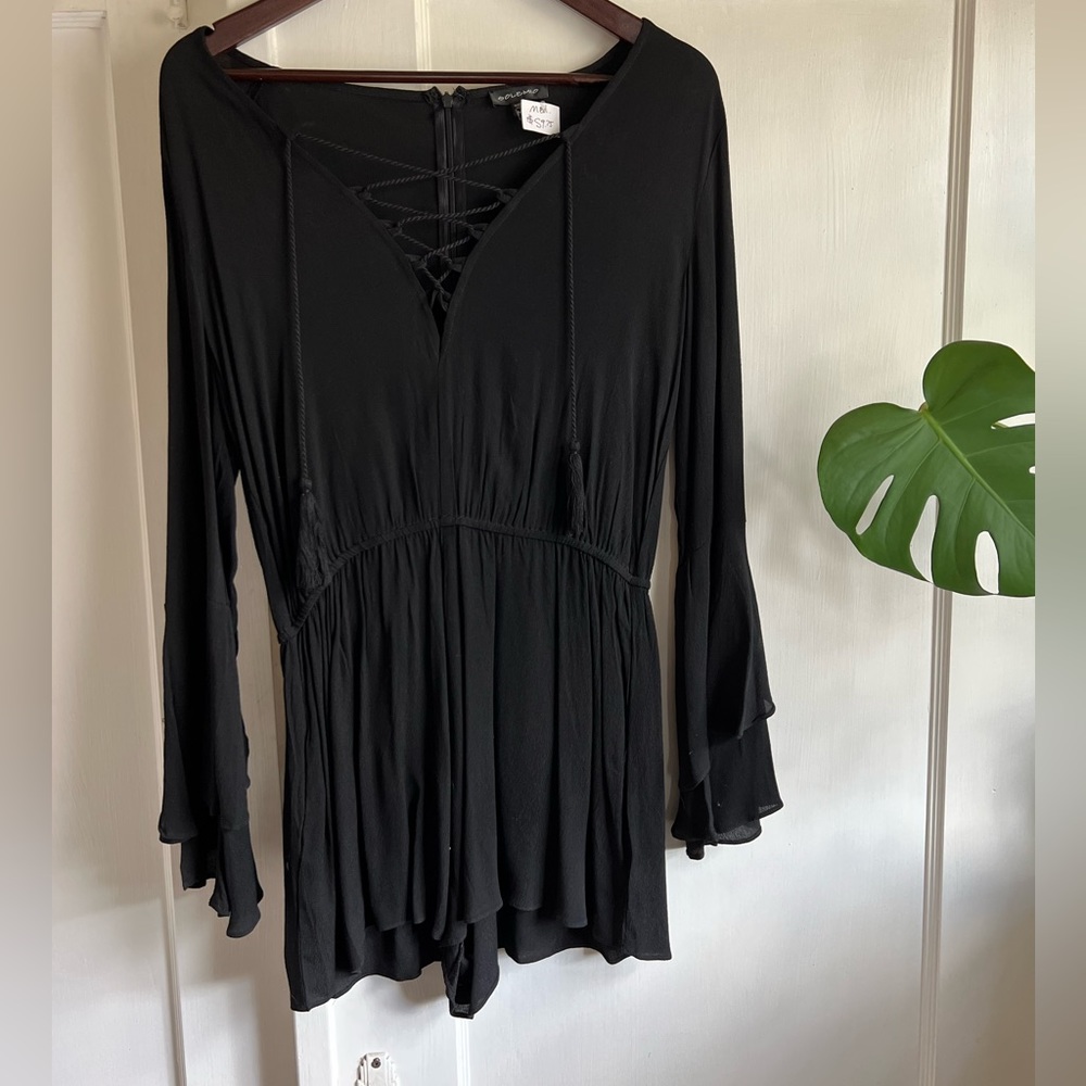 Black 70s style, long bell sleeve romper